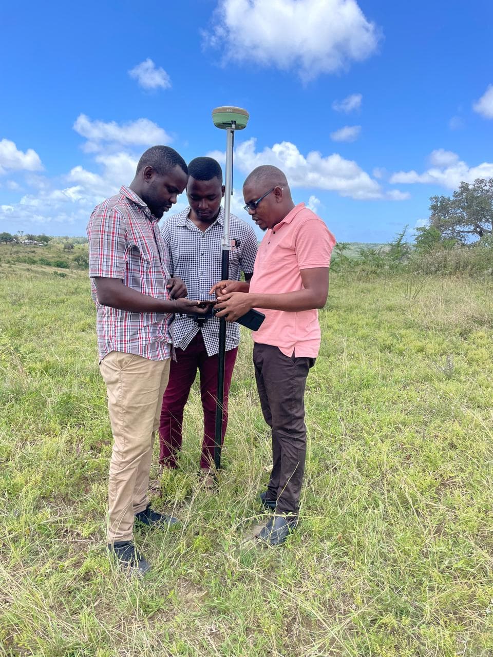 Surveying team at work